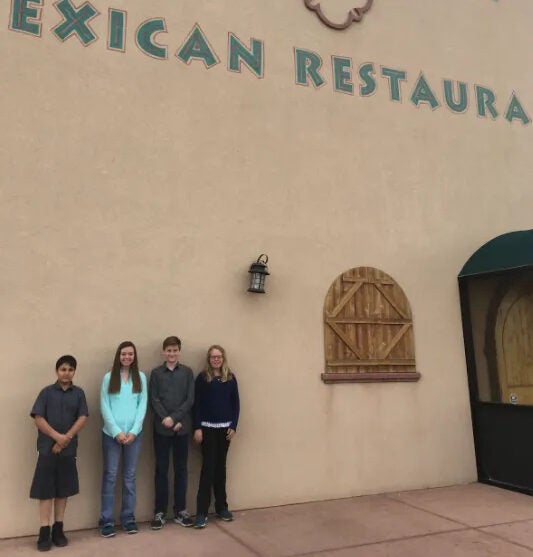 Members of the PolyPunchers prepare for a meeting with the owner of Corona Village Mexican Restaurant to discuss their proposal.