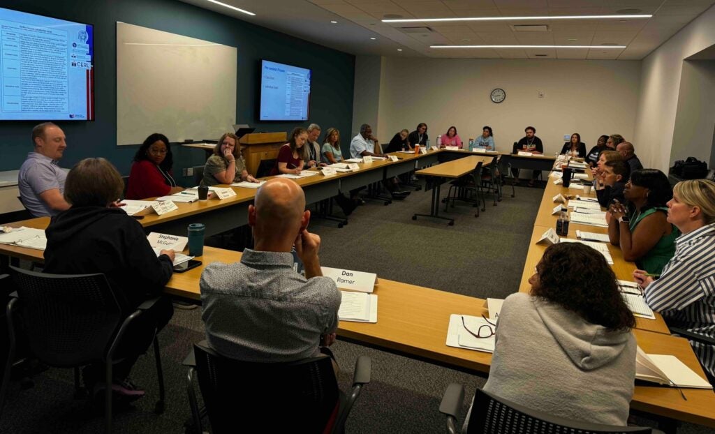 Teachers participate in a Paideia seminar